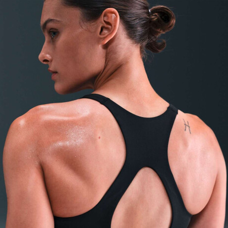 Top Nike Dri-Fit Uneversa De Mujer Negro