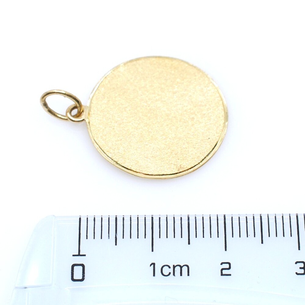 Medalla en oro 18k amarillo. Díametro 20mm Medalla en oro 18k amarillo. Díametro 20mm