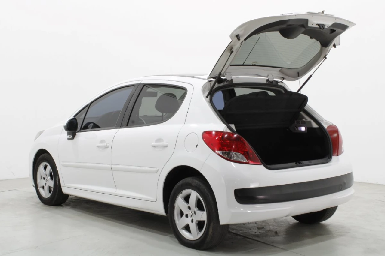 1-peugeot-207-baul.jpg