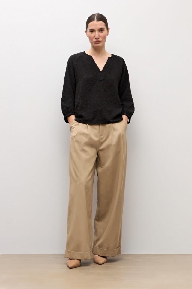 Blusa plumeti escote V negro