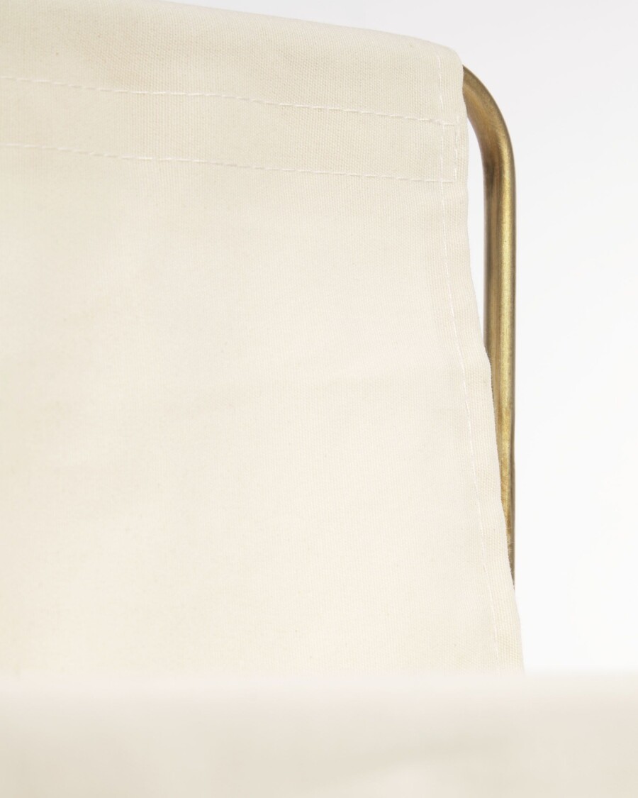 Revistero Siana beige y metal dorado