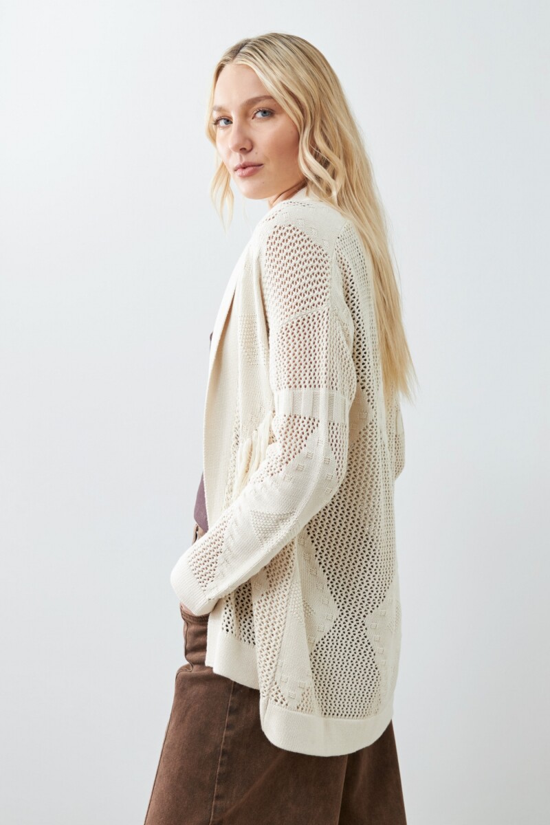 Ruana con flecos beige claro