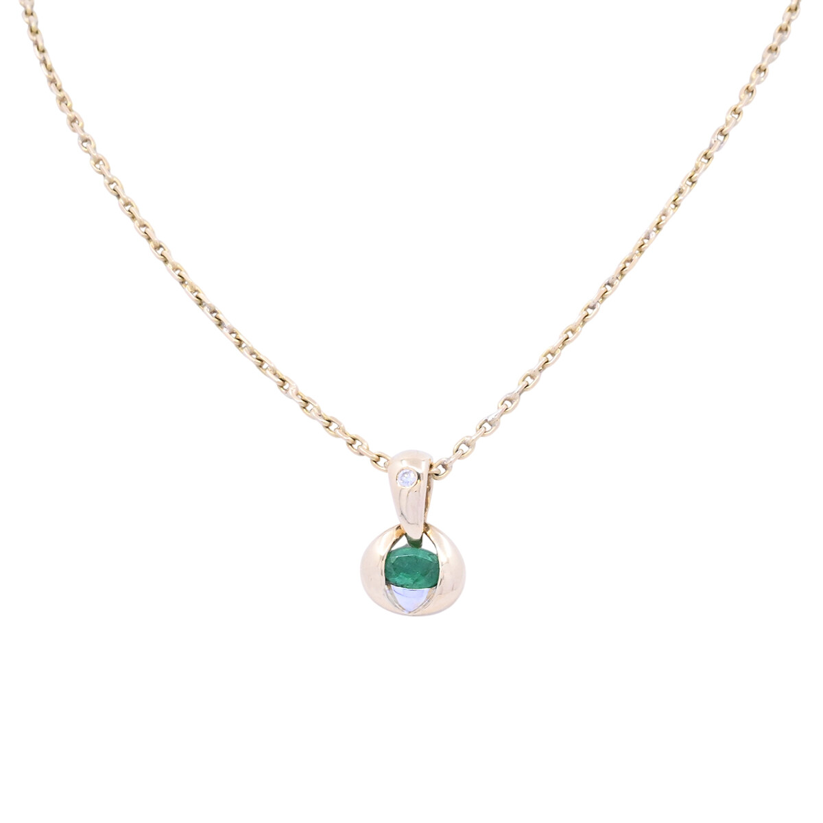 Colgante oro 18k 2 tonos con esmeralda oval y brillante. 