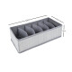 Organizador con divisiones 32x16x9cm GRIS