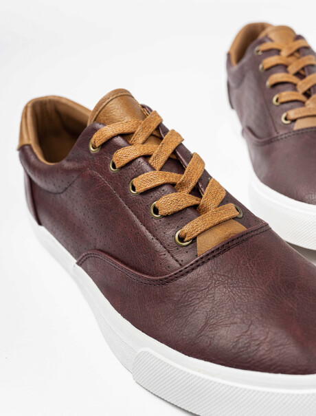 Champion perforado tostado