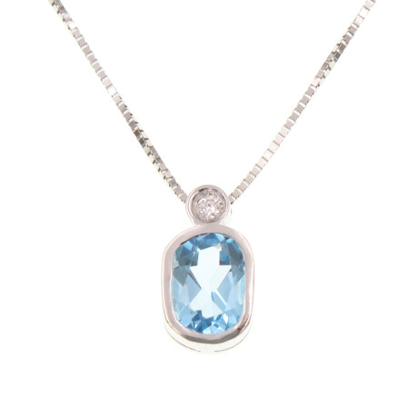 Colgante Silvia de oro blanco 18k con brillante y topacio azul. Incluye cadena 4