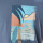 REMERA ESTAMPADA DE ALGODÓN Piedra