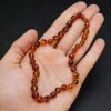 Collar ambar piedra redonda marron