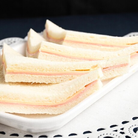 Sandwich de jamón y queso (4 unidades) Pan blanco