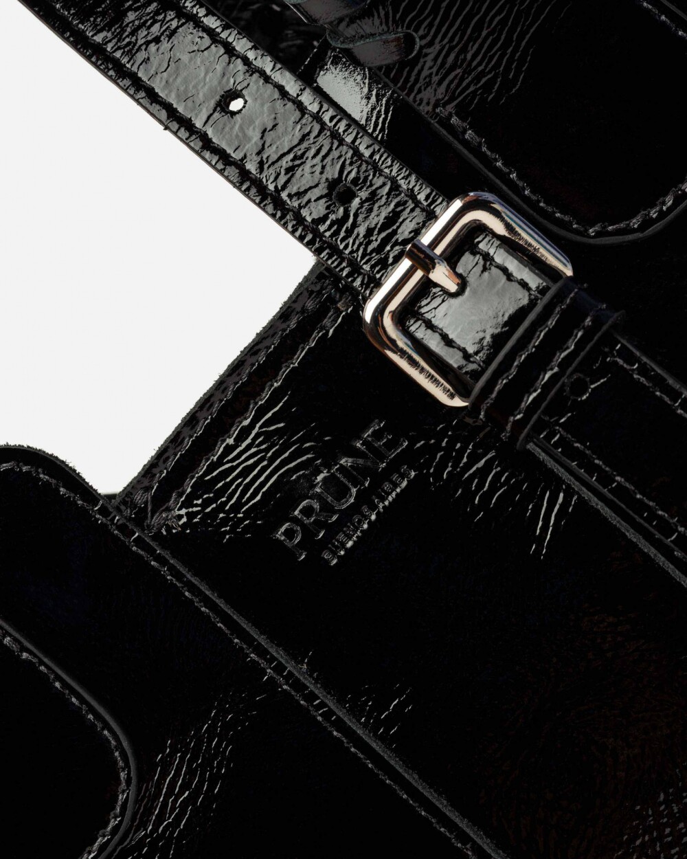Cartera de mano The Braided en cuero charol arrugado Negro