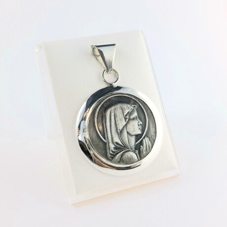 Medalla de la Virgen Niña en plata 925. Medalla de la Virgen Niña en plata 925.