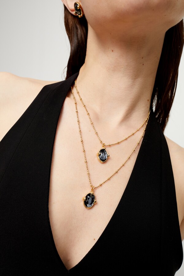 COLLAR DOBLE DE ALEACIÓN DE METALES BAÑADO EN ORO Y 2 CRISTALES FACETADOS PEQUEÑOS Colgante