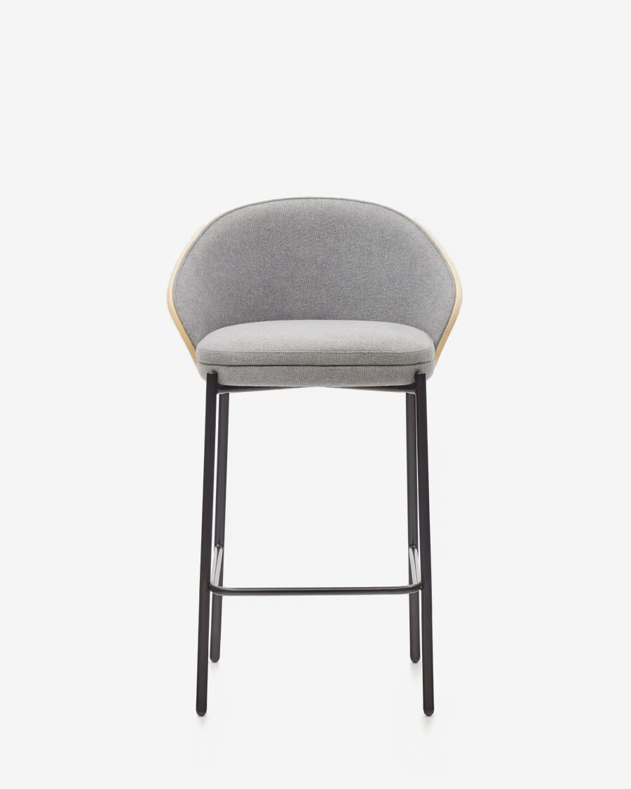 Taburete Eamy de chenilla gris claro chapado en fresno acabado natural y metal negro 65 cm Taburete Eamy de chenilla gris claro chapado en fresno acabado natural y metal negro 65 cm