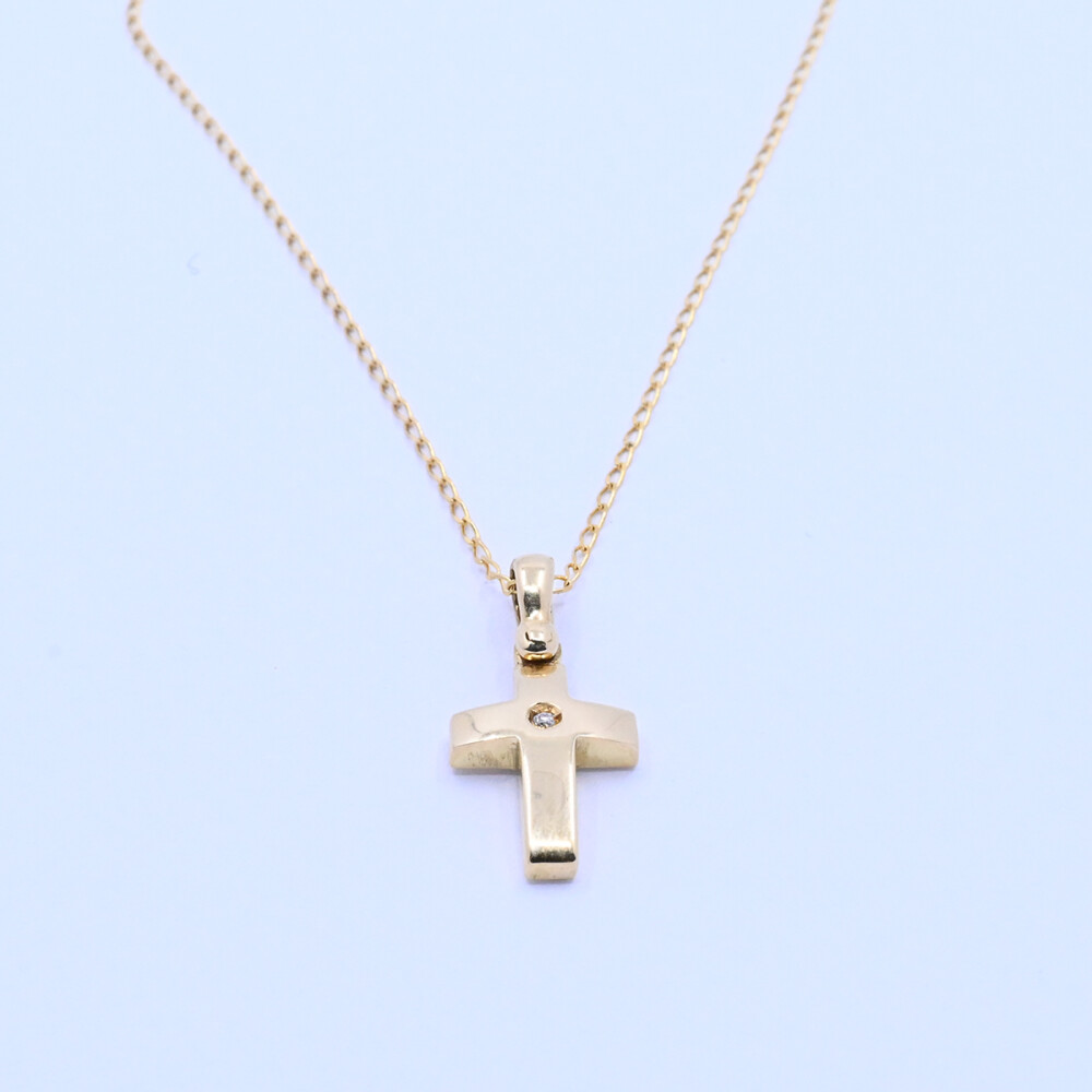 Cruz oro 18k bombé con brillante. Cruz oro 18k bombé con brillante.