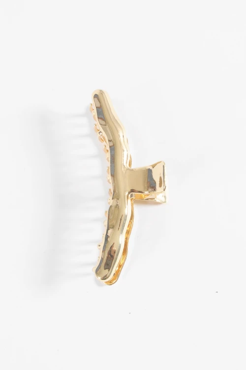 Broche metálico irregular dorado