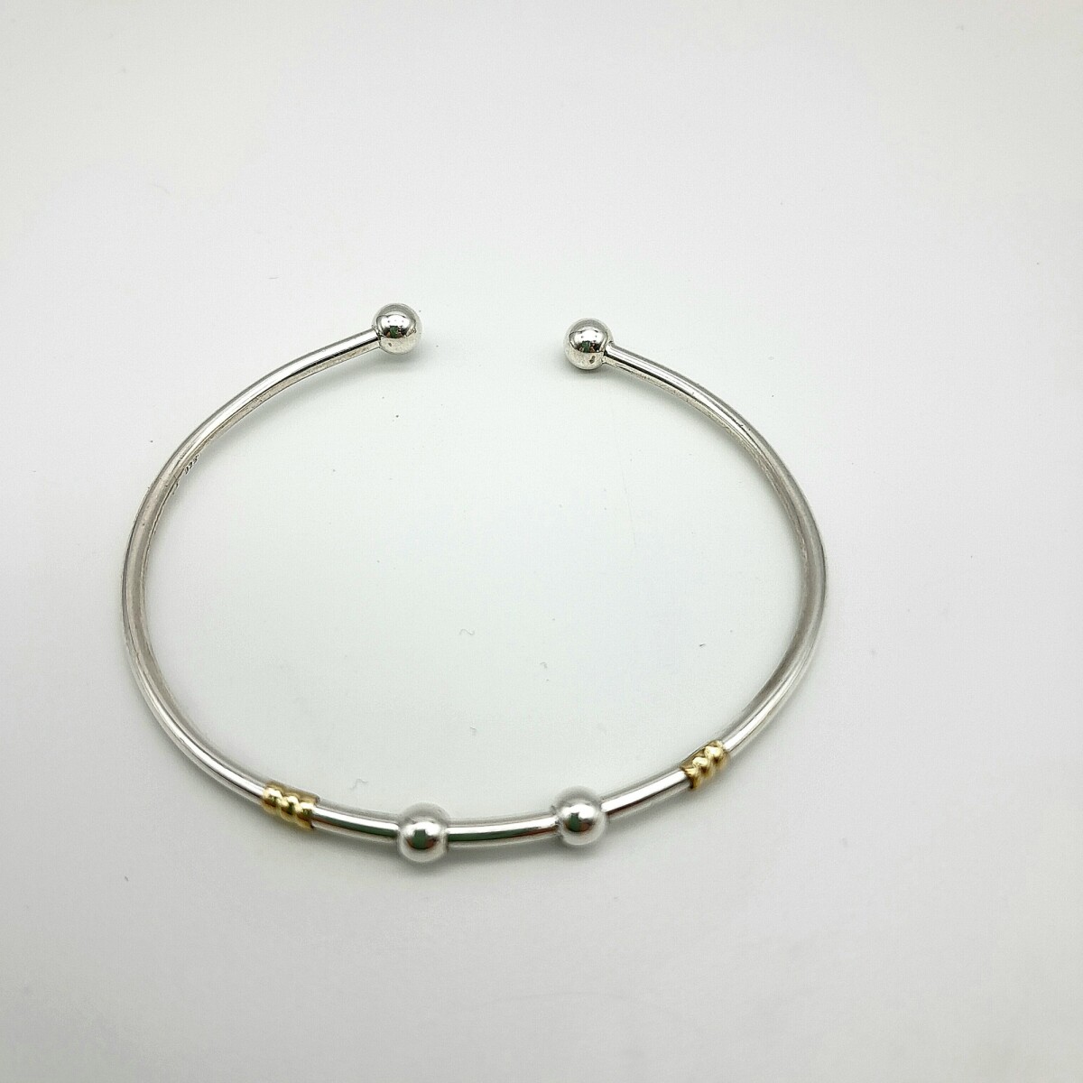 Esclava de plata 925 y double en oro 18 ktes. 