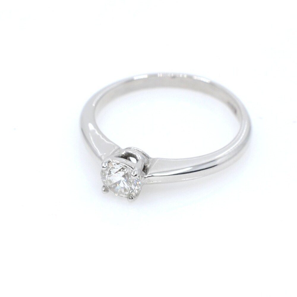 Anillo solitario en oro 18k y brillante Anillo solitario en oro 18k y brillante