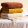 Manta sillon y cama tejida 127 x 172cm beige