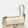 Cartera al hombro Signature en cuero charol Natural