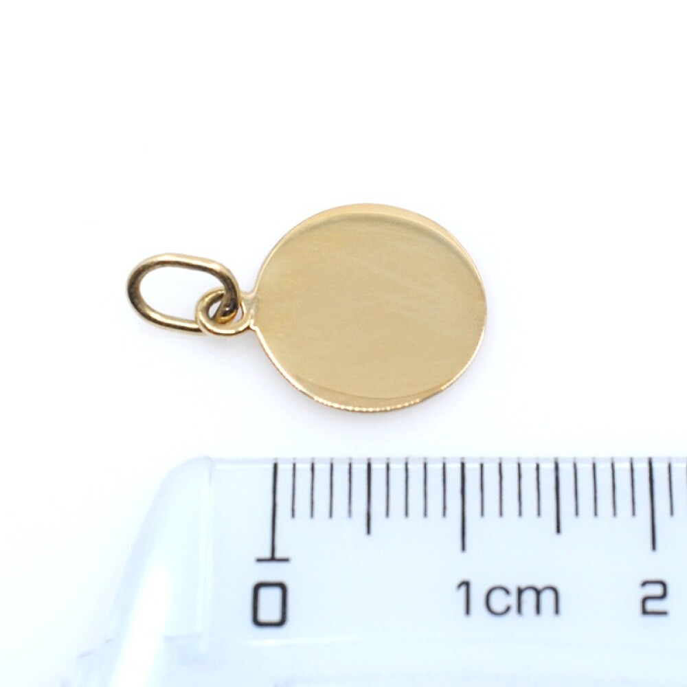 Medalla en oro 18k lisa redonda. Diametro 12mm Medalla en oro 18k lisa redonda. Diametro 12mm