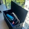 Caja baúl para exterior con ruedas negro