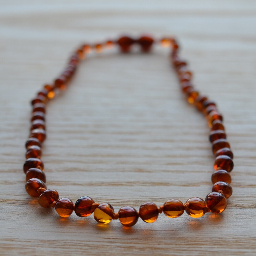 Collar ambar piedra redonda marron