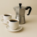 Pack Cafetera Italiana Tramontina + 2 Taza con Plato Pack Cafetera Italiana Tramontina + 2 Taza con Plato
