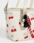 City Cartera City Con Charm - Blanco Crudo