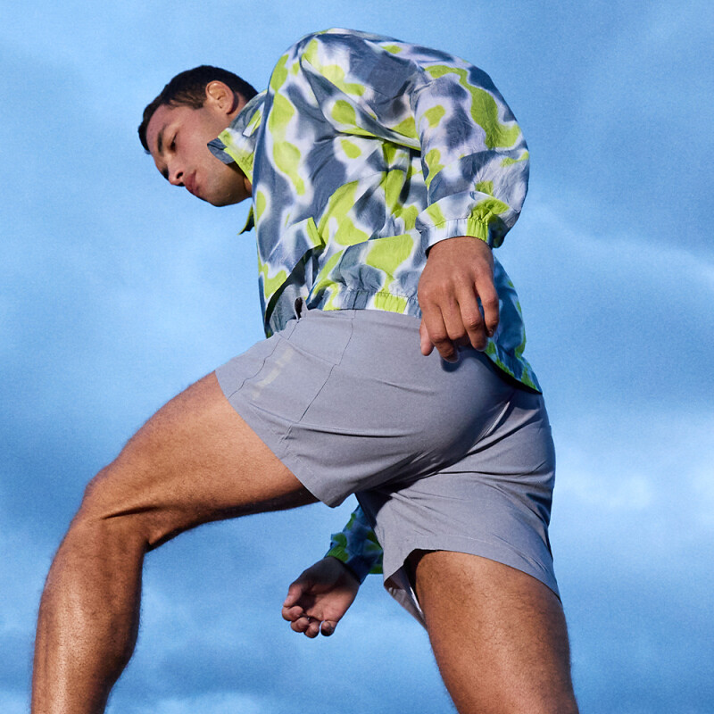SHORT RUNNING ZEAL II petroleo gulf GRIS CLARO/NEGRO/NARANJA