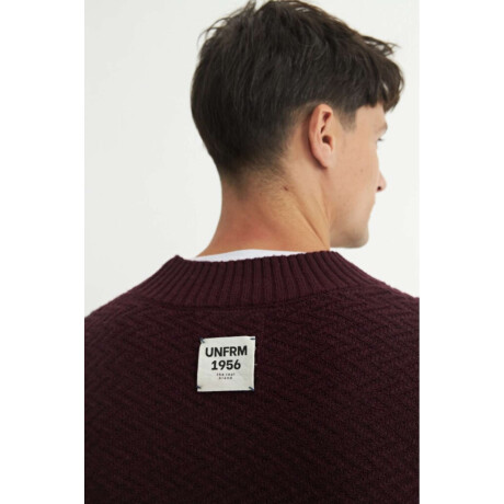 Buzo punto Damien Vino