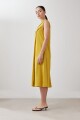 Vestido de lino acampanado con detalle desflecado pistacho