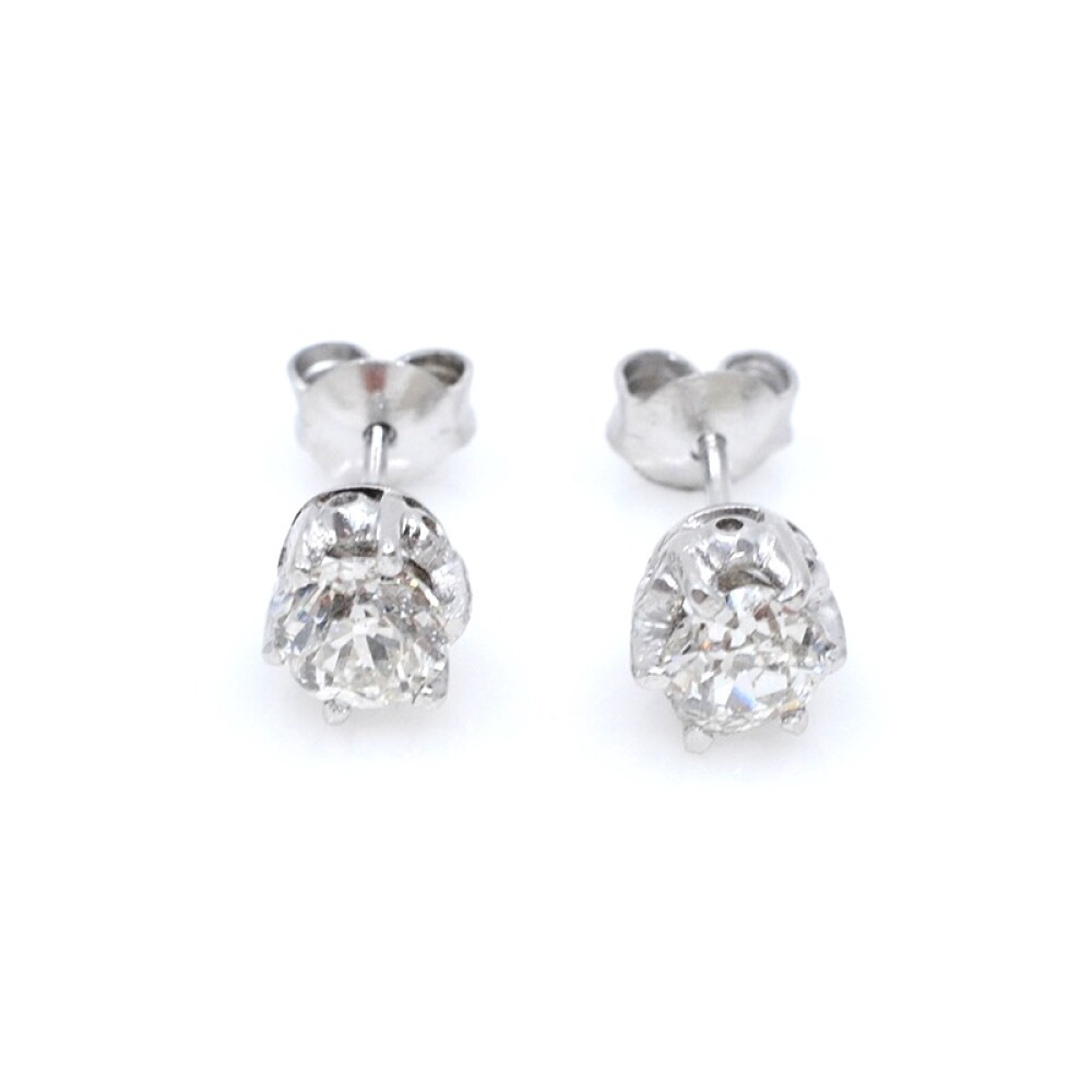 Caravanas en oro 18k blanco y brillantes. Caravanas en oro 18k blanco y brillantes.