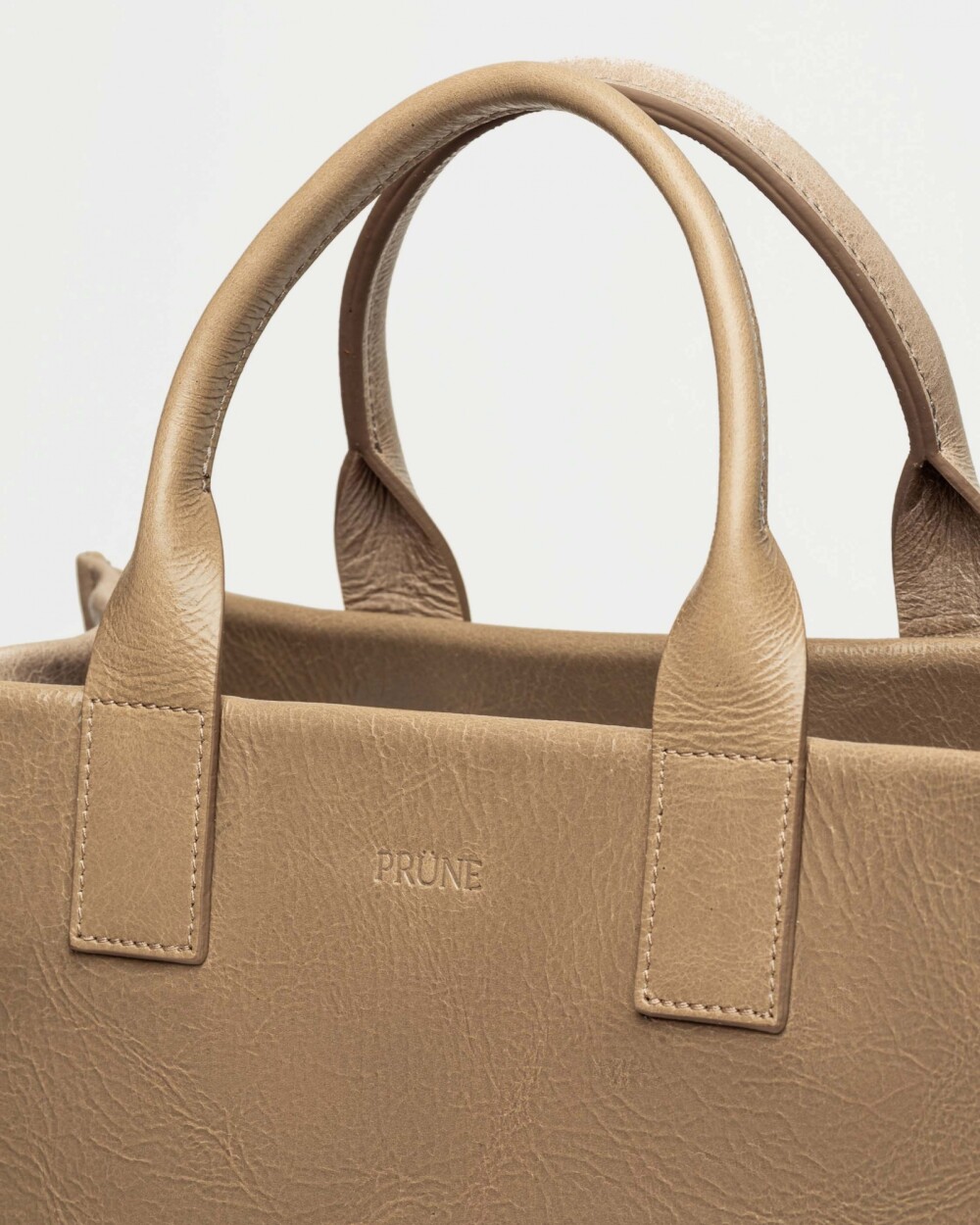 Cartera de mano Capri en cuero arrugado Taupe Niquel