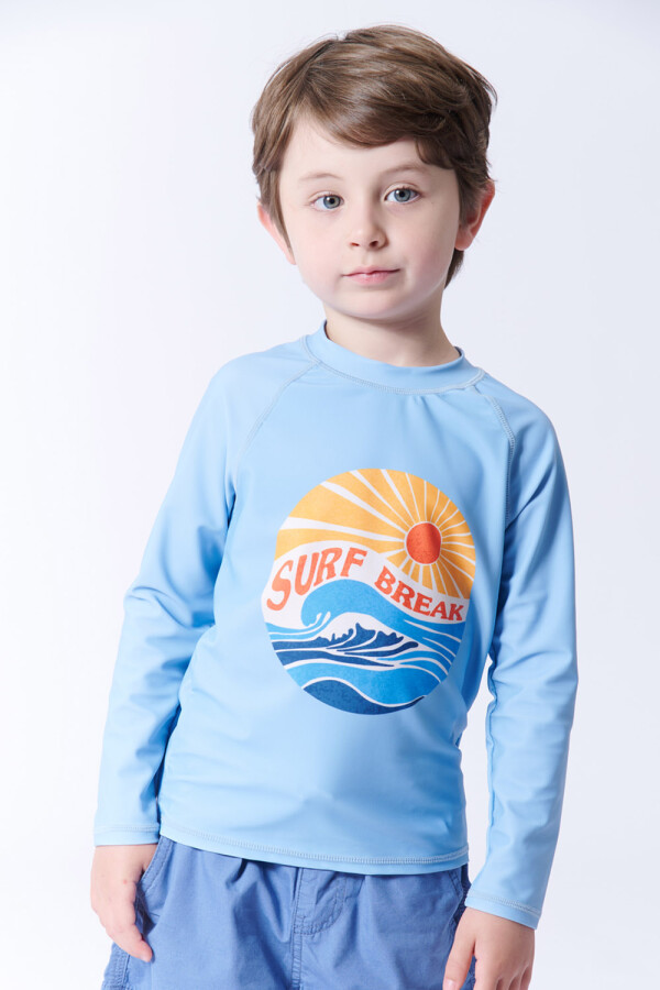 Remera manga larga uv Surf Break Celeste