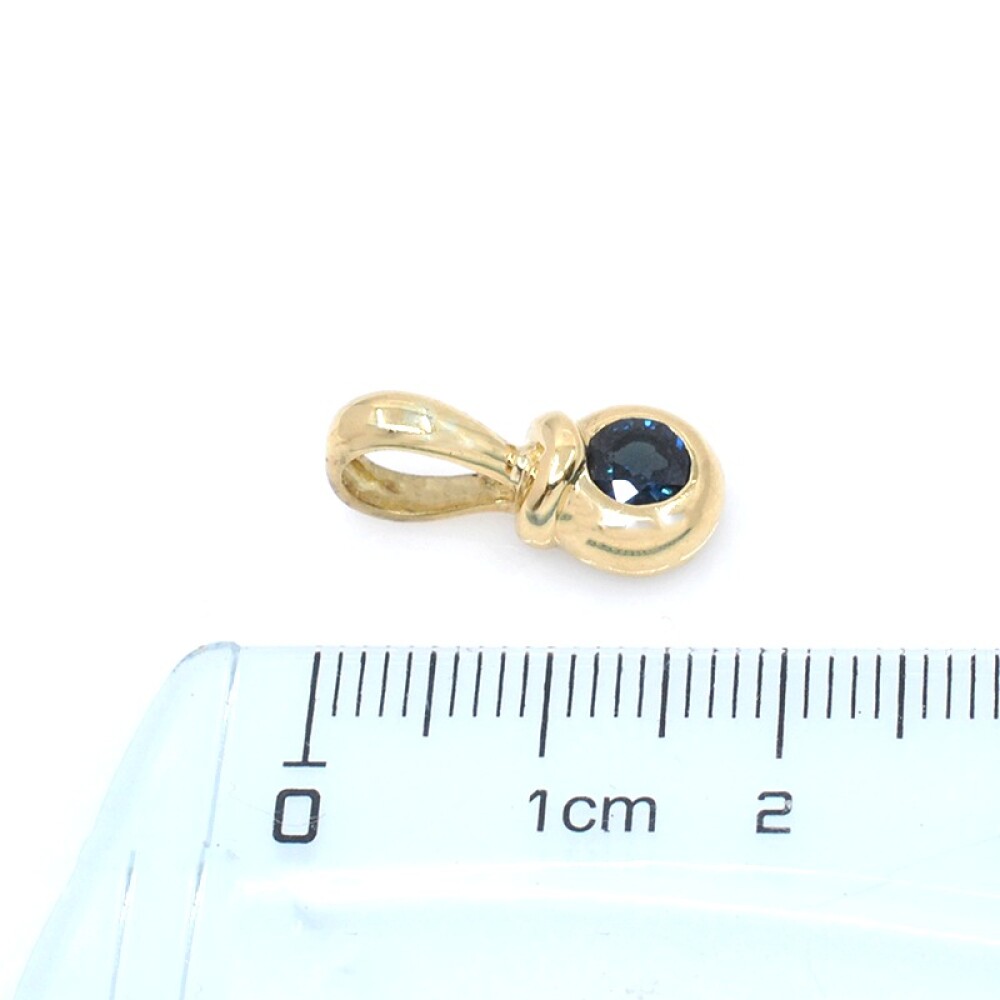 Colgante en oro 18k con zafiro azul Colgante en oro 18k con zafiro azul