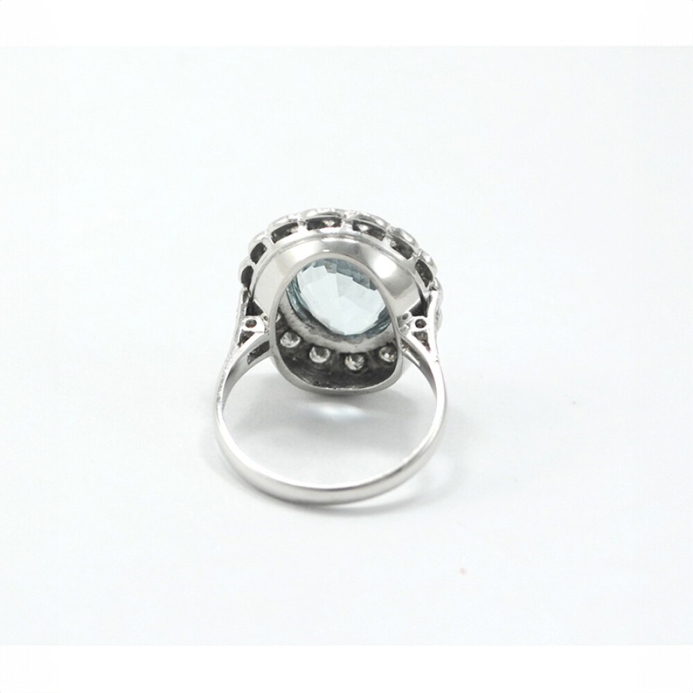 Anillo Oro 18K Blanco Con Aguamarina Central Y Brillantes Anillo Oro 18K Blanco Con Aguamarina Central Y Brillantes