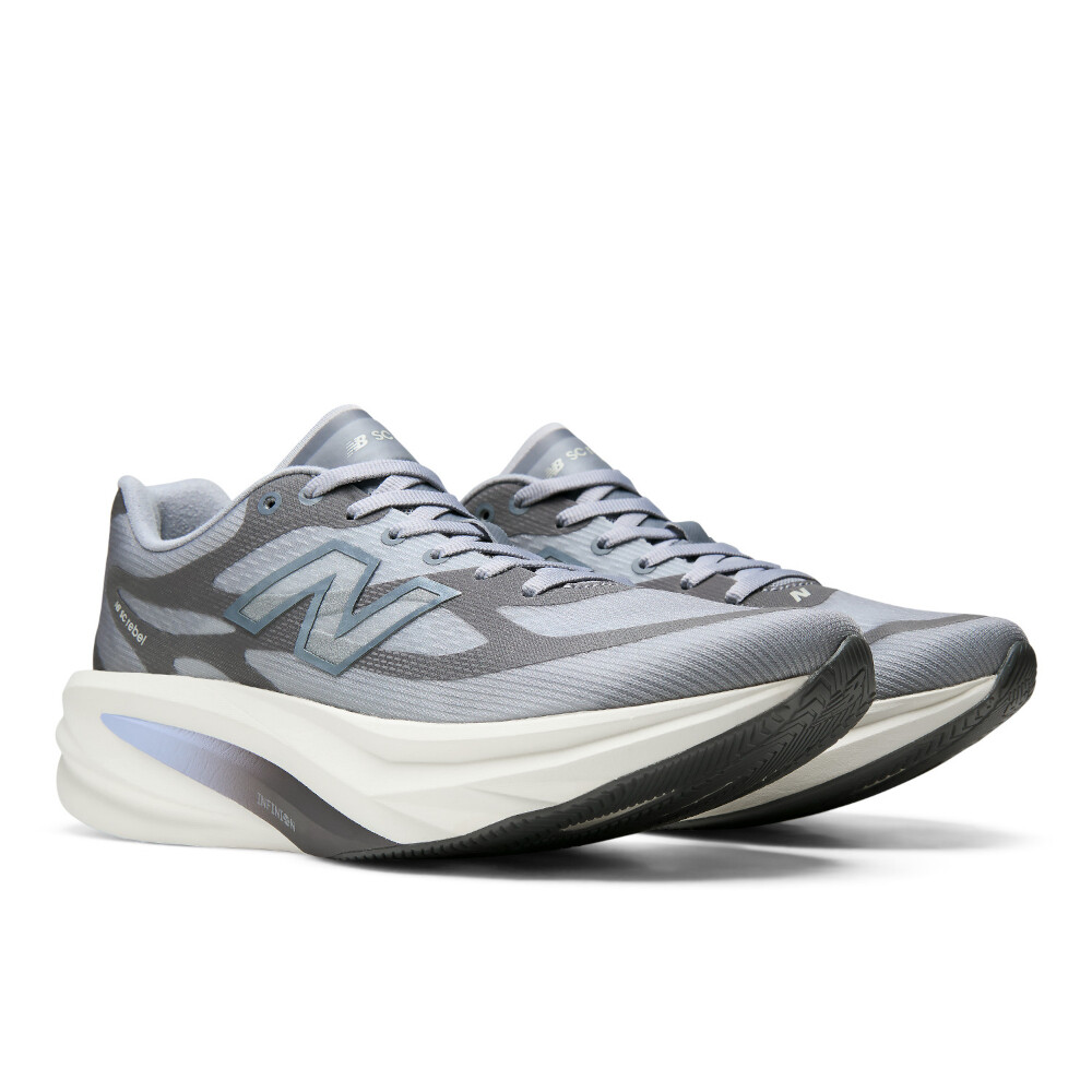 Zapatillas Running Supercomp Rebel V1 Mujer Grey