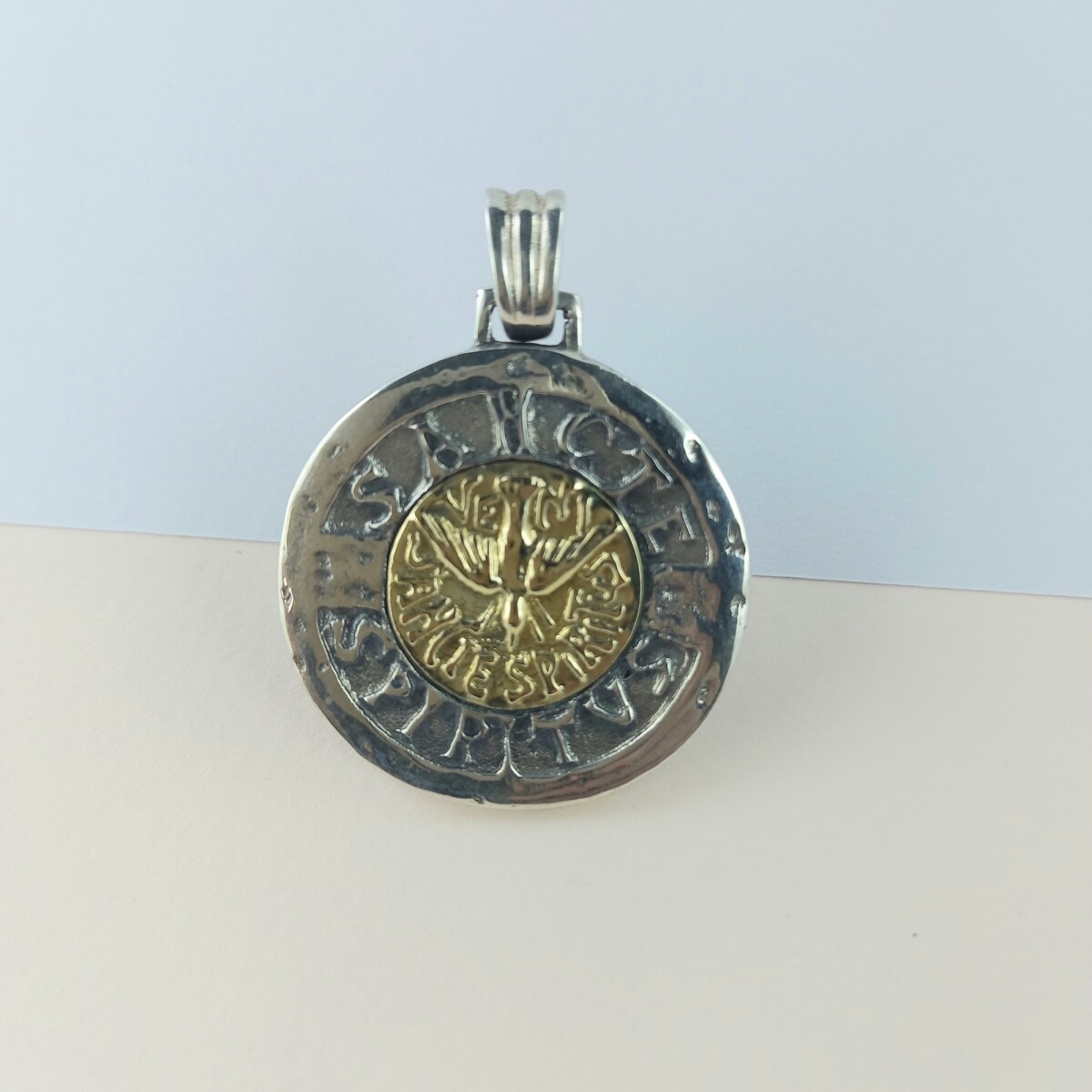 Medalla religiosa de plata 925 y double en oro 18 ktes, ESÏRITU SANTO. 
