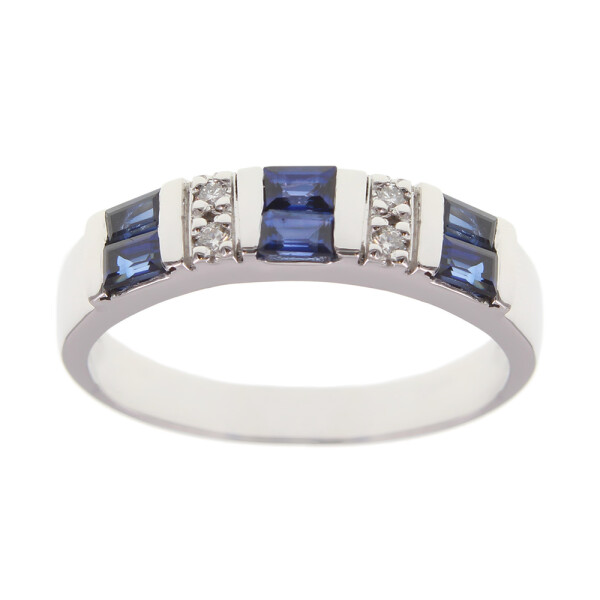 Anillo Calypso en oro blanco 18k con brillantes y zafiros azules Anillo Calypso en oro blanco 18k con brillantes y zafiros azules