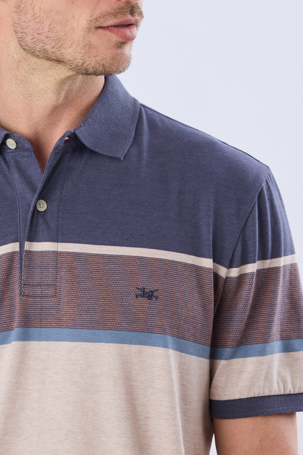REMERA POLO RAYADA JERSEY Azul