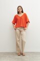 Sweater oversized escote V naranja