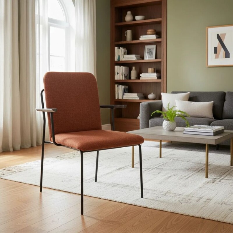 Silla con apoyabrazos - Tapizada en tela terracota, patas metal con detalle de circulo de madera. Silla con apoyabrazos - Tapizada en tela terracota, patas metal con detalle de circulo de madera.
