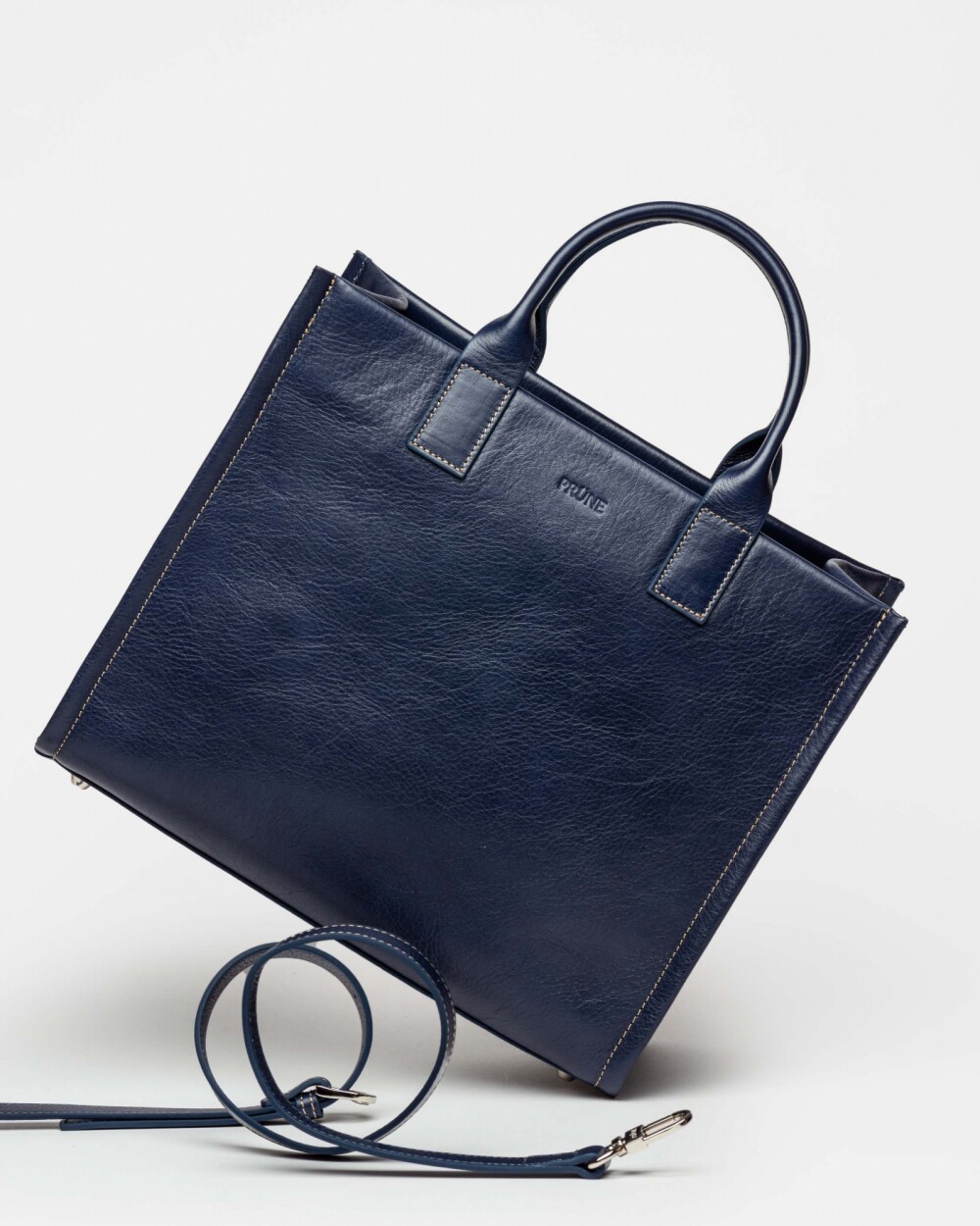 Cartera de mano Capri en cuero vegetal liso Marine Blue