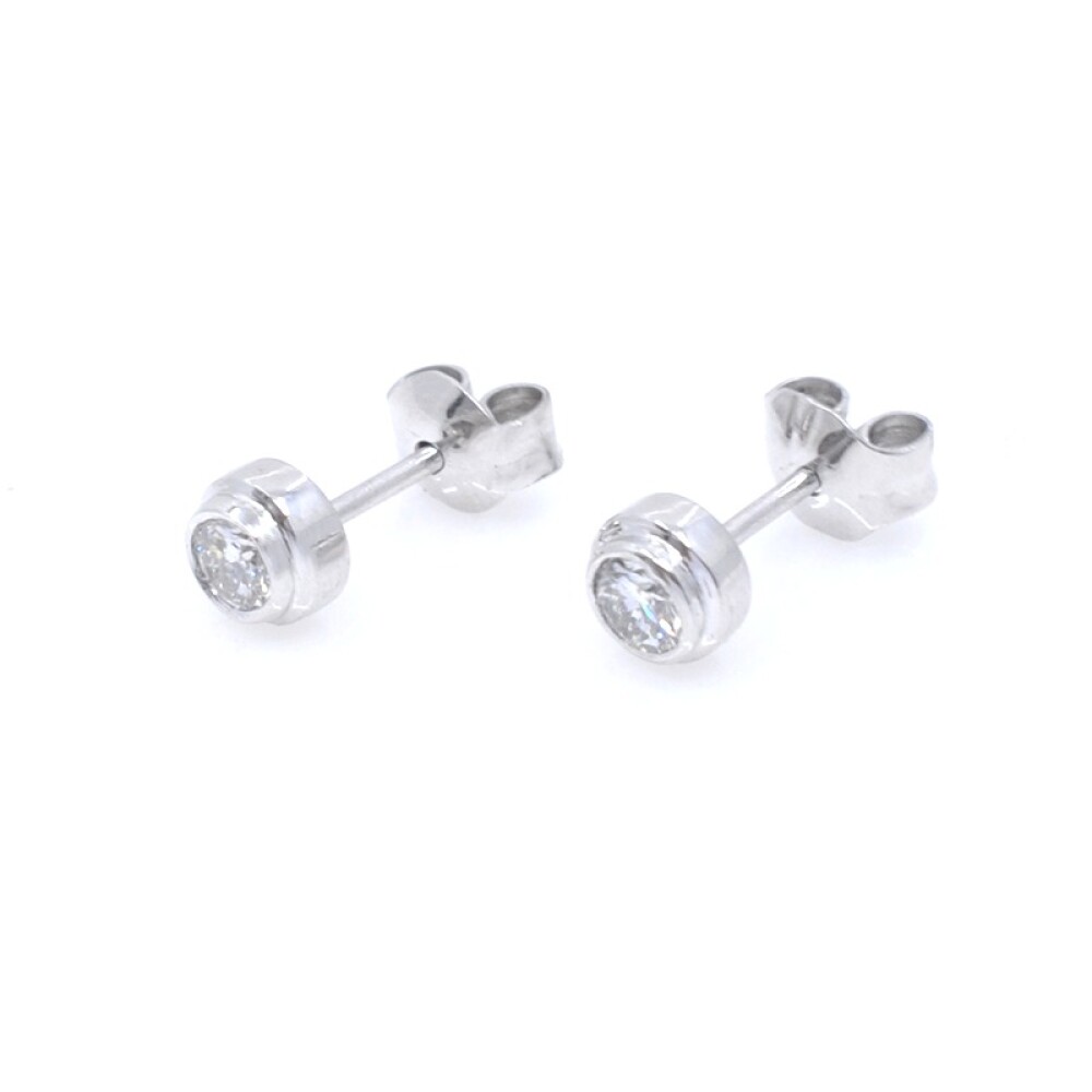 Caravanas en oro blanco 18k y brillantes Caravanas en oro blanco 18k y brillantes