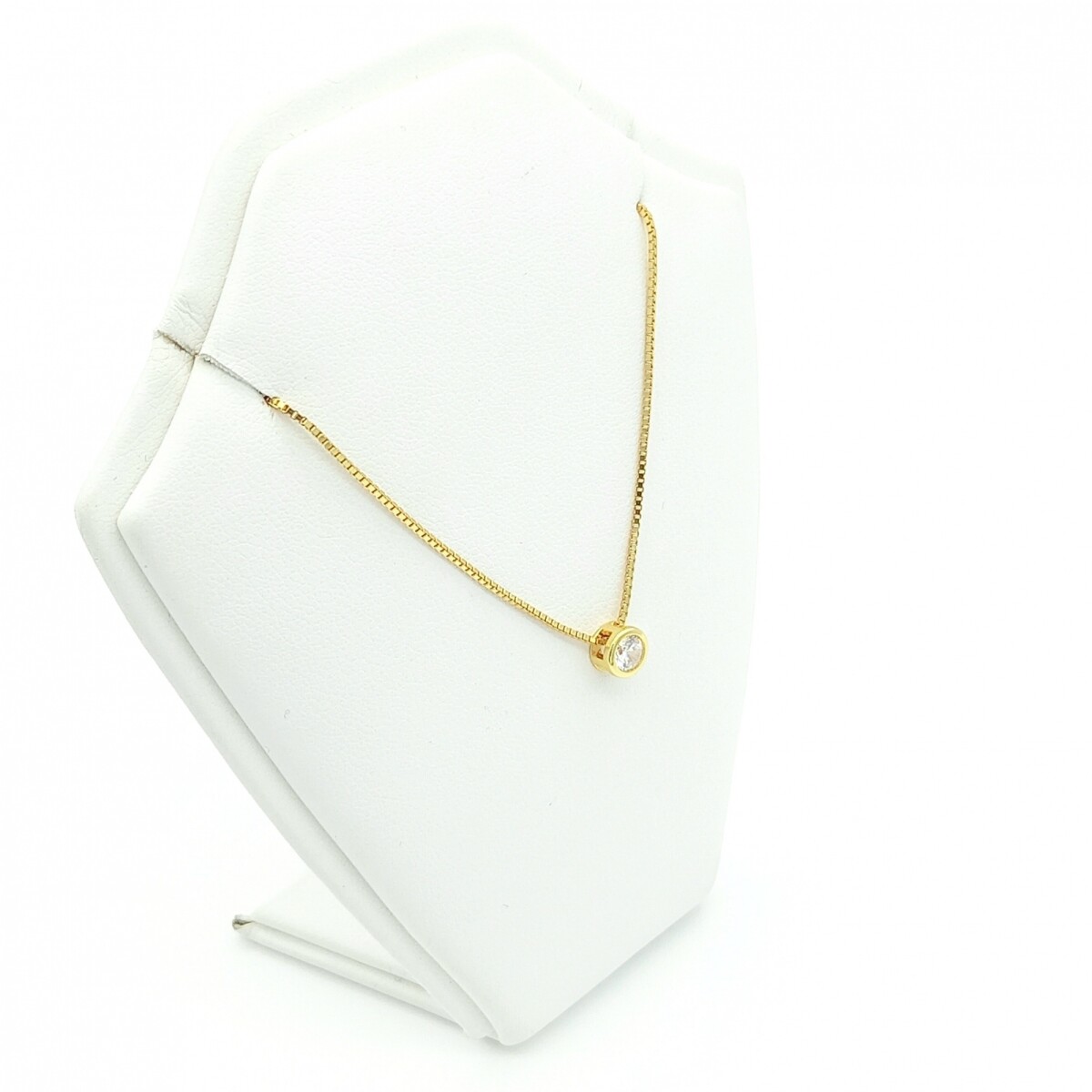 Colgante de plata 925 con baño de oro amarillo y circonias, PUNTO DE LUZ. 