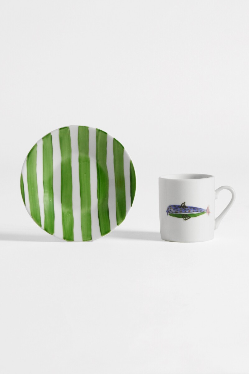 Taza de café con plato selva marina