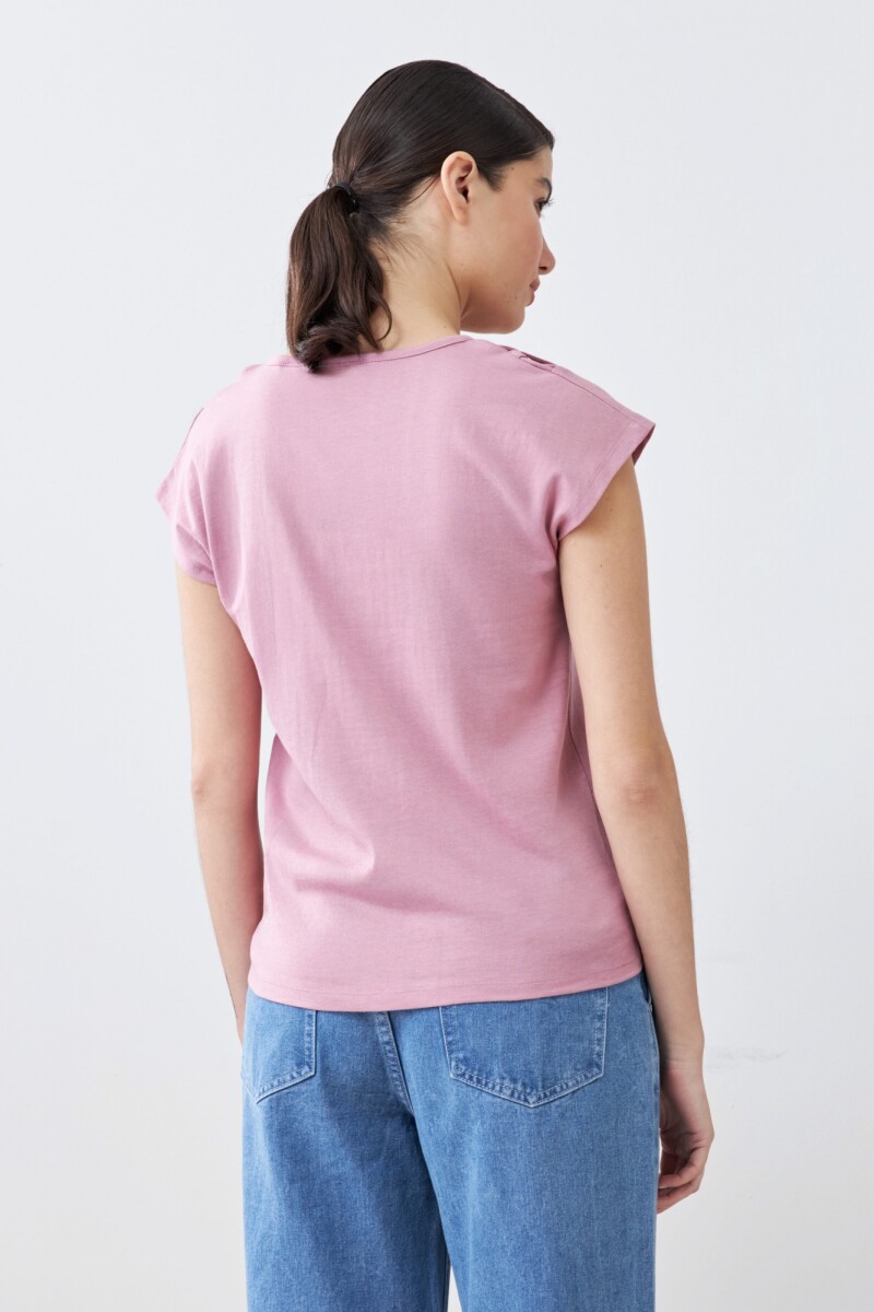 Remera calada rosa