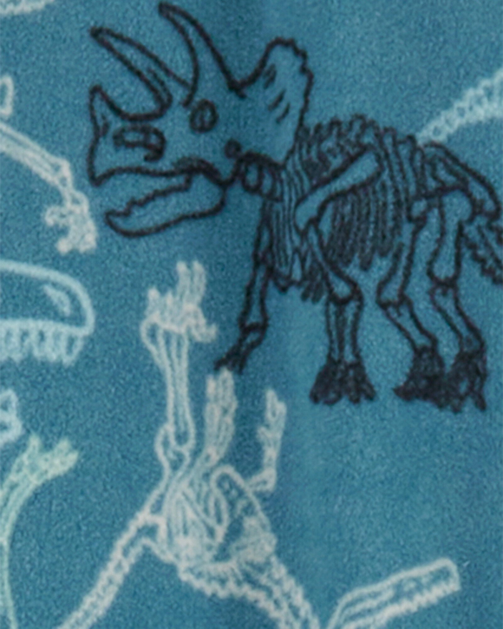 Pijama uno pieza de micropolar, con pie, diseño esqueletos de dinosaurio Pijama uno pieza de micropolar, con pie, diseño esqueletos de dinosaurio