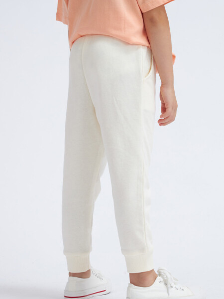 Pantalón deportivo jogger liviano Crudo