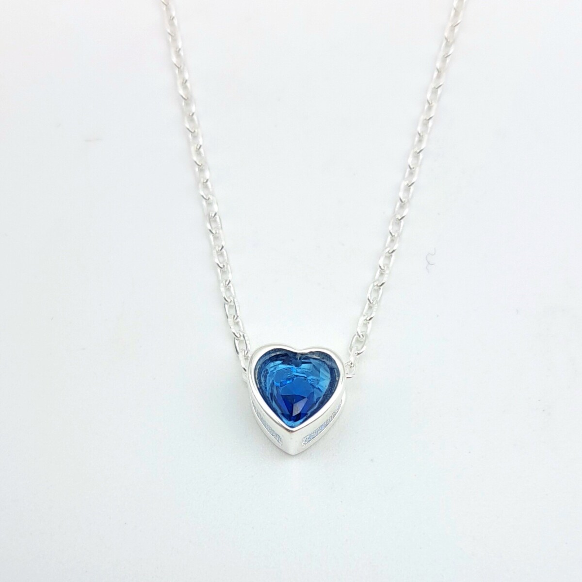 Dije de plata 925 con circonia, PUNTO DE LUZ. 